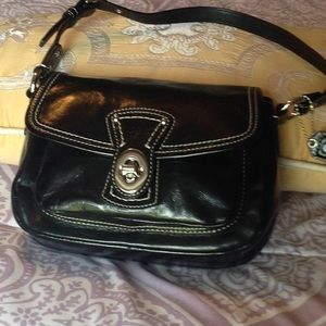 COACH -small black patent leather purse.